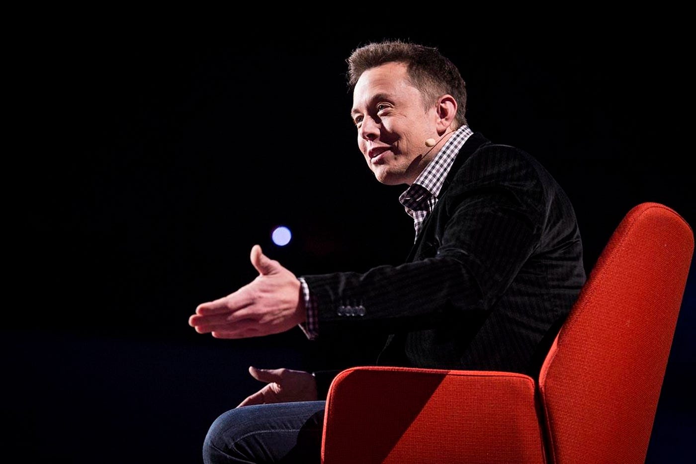 Elon Musk talking on stage